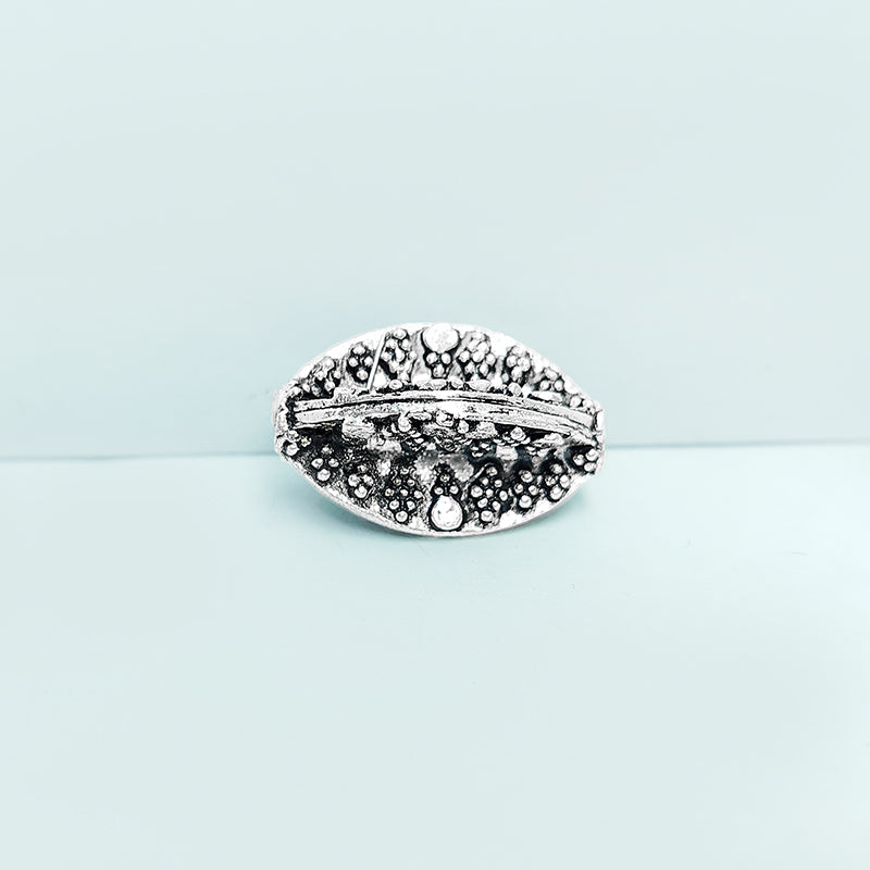 Handcrafted silver overlay oval bead from India with oxidized finish and granulated design for retail jewelry making