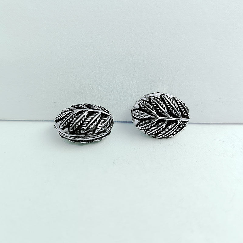 Handcrafted silver overlay oval bead from India with oxidized finish and leaf carved design for retail jewelry making
