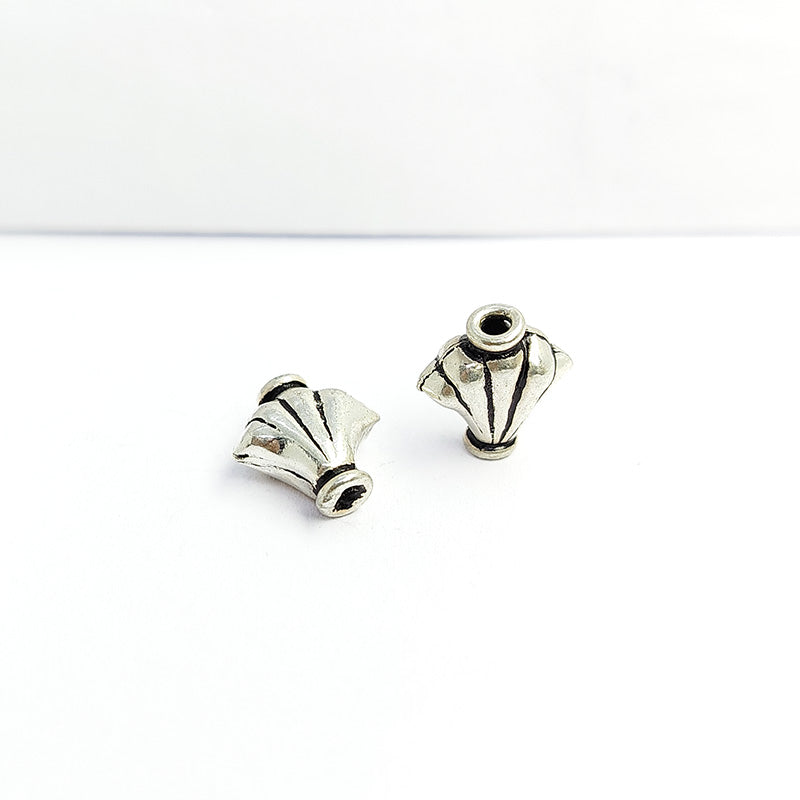 Handcrafted silver overlay fan bead from India with oxidized finish and fluted design for retail jewelry making
