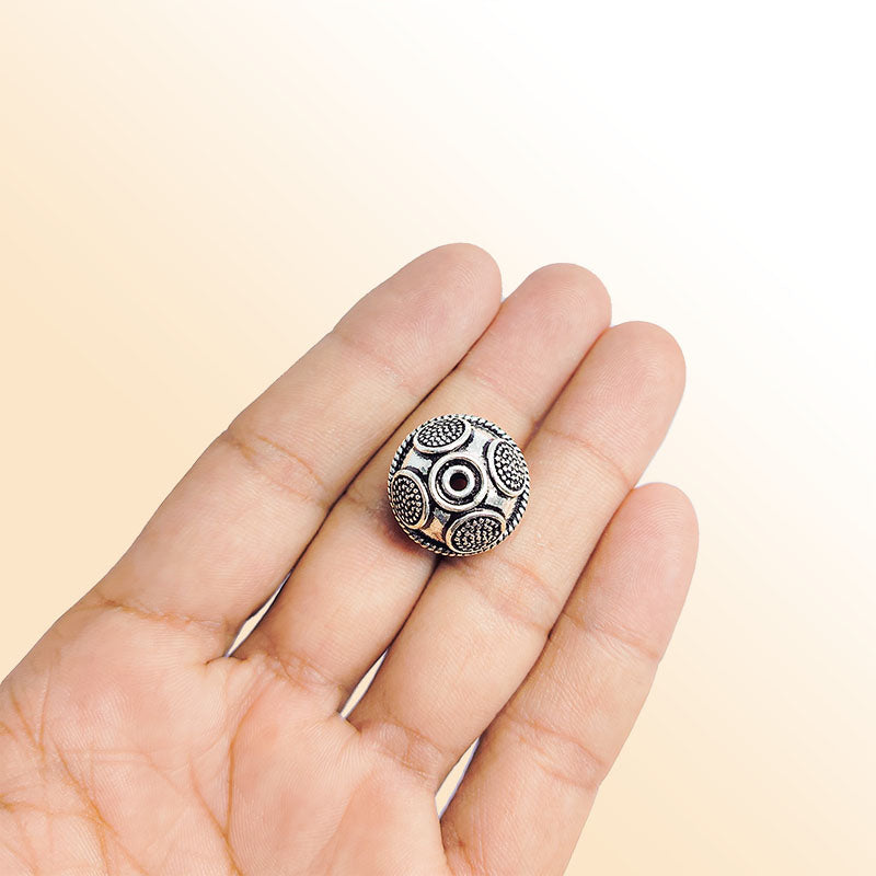 Handcrafted silver overlay round bead from India with oxidized finish and granulated disc design for retail jewelry making