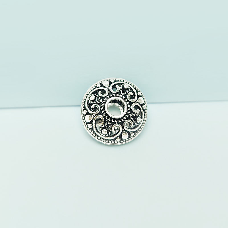 Handcrafted silver overlay round bead from India with oxidized finish and scroll filigree design for retail jewelry making
