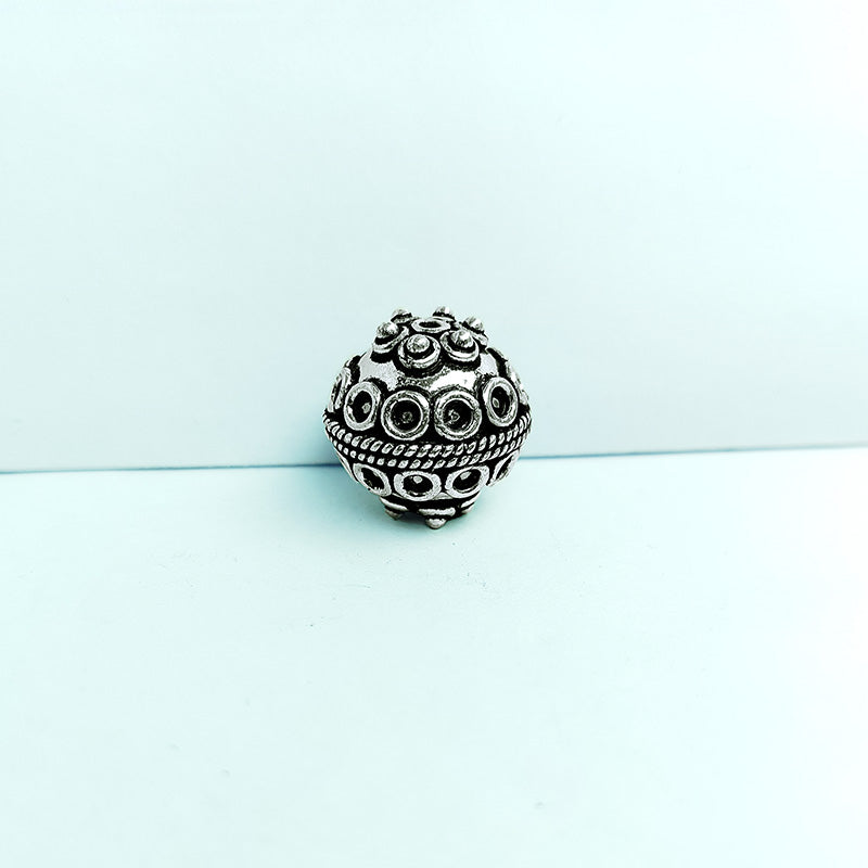 Handcrafted silver overlay round bead from India with oxidized finish and raised dot design for retail jewelry making