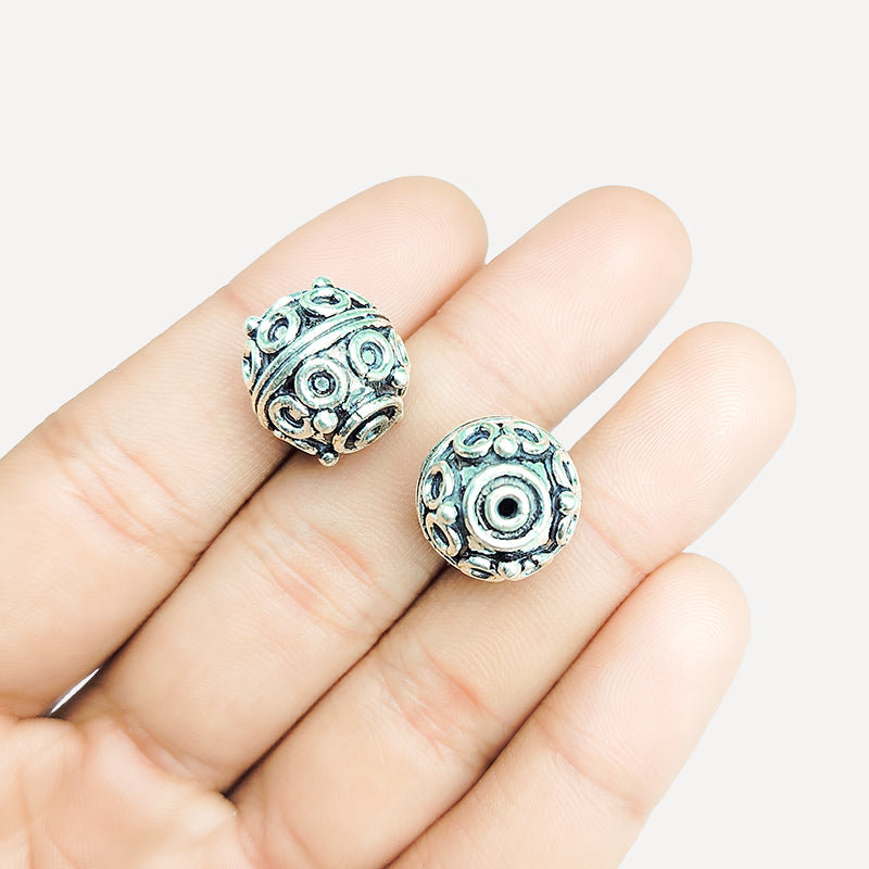 Handcrafted silver overlay round bead from India with oxidized finish and scroll ring design for retail jewelry making