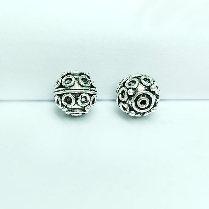 Handcrafted silver overlay round bead from India with oxidized finish and scroll ring design for retail jewelry making