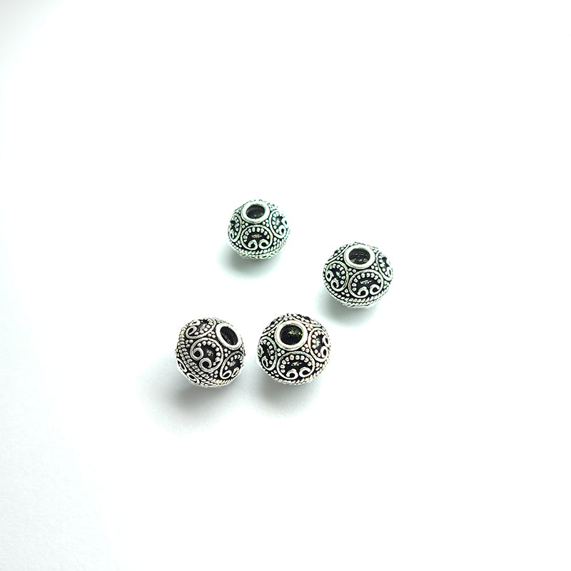 Silver overlay over copper handcrafted scroll bead from India with antique finish jewelry spacer