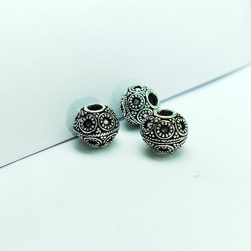 Silver overlay over copper handcrafted dotted bead from India with antique finish round jewelry spacer