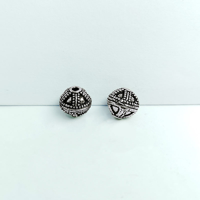 Silver overlay over copper handcrafted geometric dome bead from India with antique finish jewelry spacer