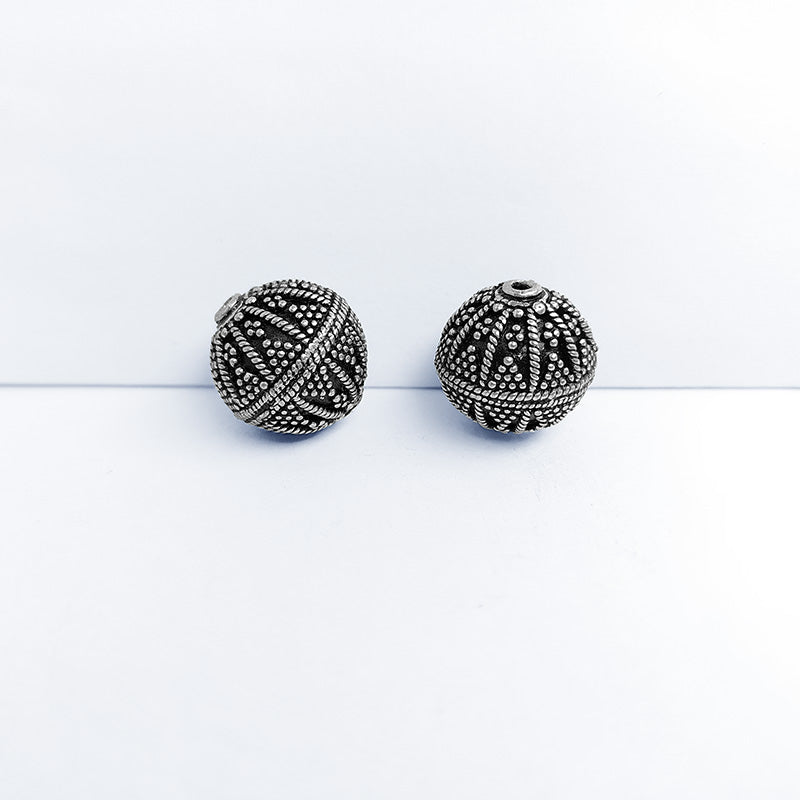 Silver overlay over copper handcrafted radiating design bead from India with antique finish jewelry spacer