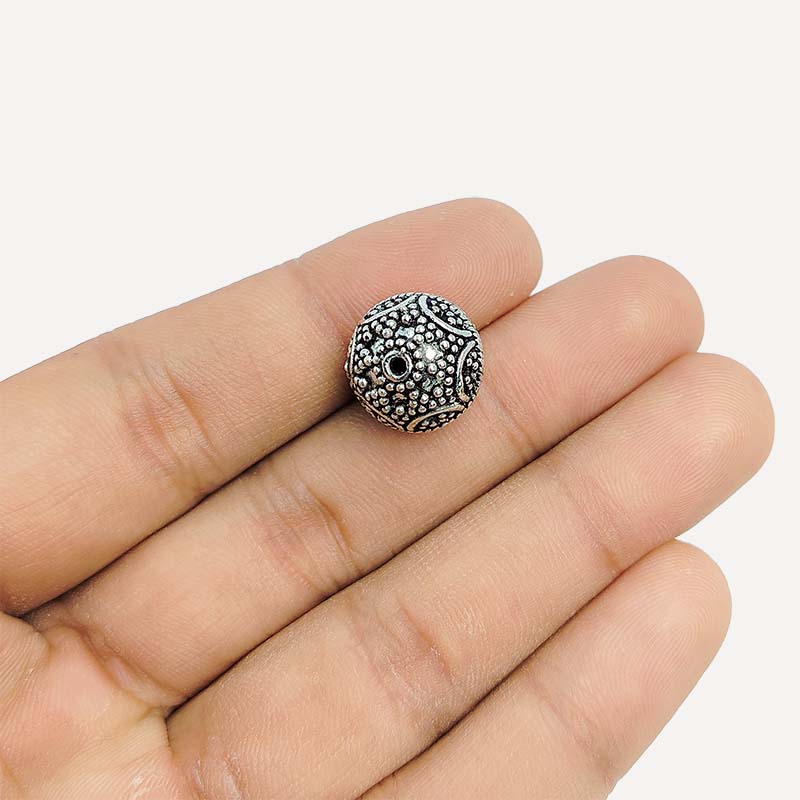 Silver overlay over copper handcrafted ornamental circle bead from India with antique finish jewelry spacer
