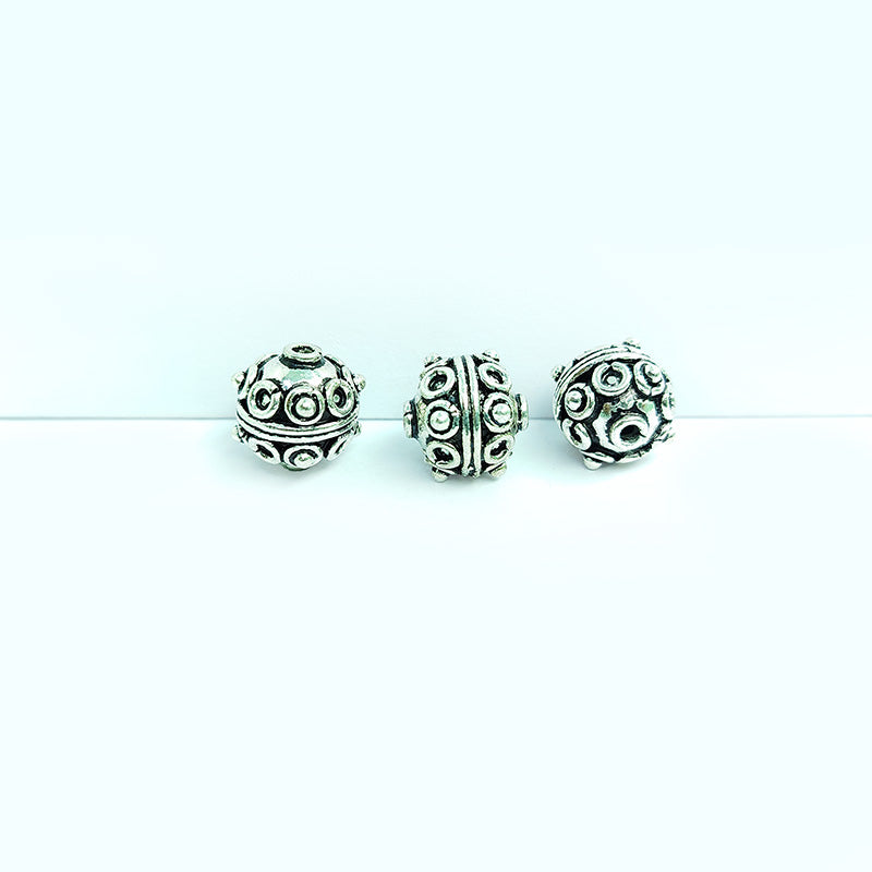 Silver overlay over copper handcrafted raised dot bead from India with antique finish jewelry spacer