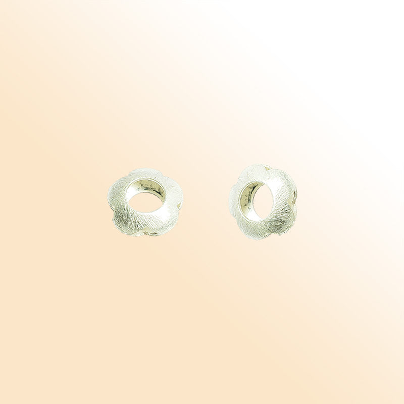 Silver overlay over copper floral spacer bead from India with textured finish for handmade jewelry designs