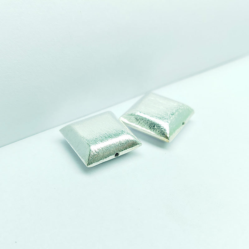 Minimal silver and copper soft square decor accent handcrafted in India with textured silver finish