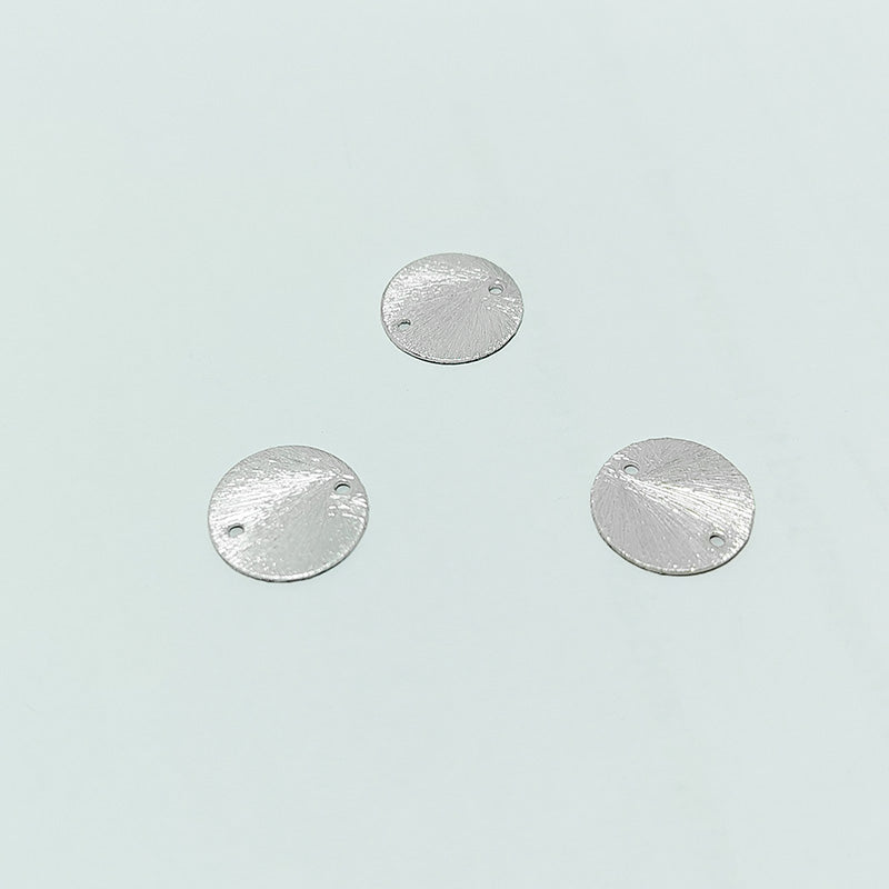 Decorative silver overlay copper textured round disc handcrafted in India with connector holes for jewelry making