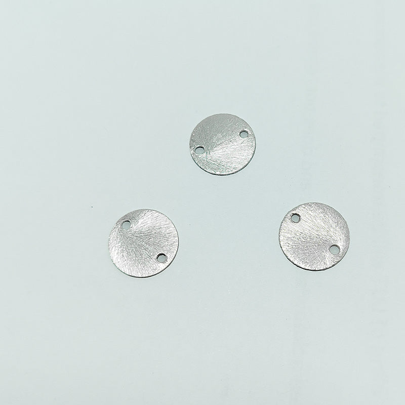 Decorative silver overlay copper textured round disc handcrafted in India with connector holes for jewelry making