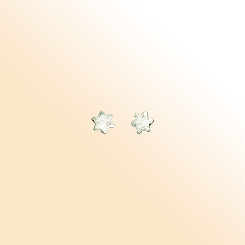 Decorative silver overlay copper textured star charm handcrafted in India with center hole for jewelry making