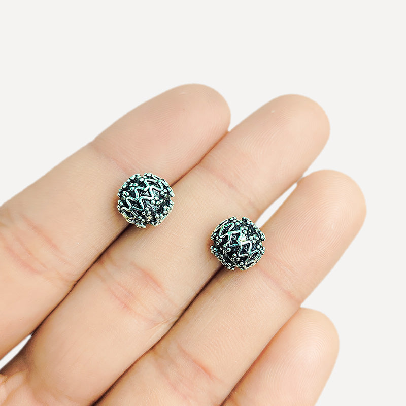 Silver overlay over copper antique dotted wave round bead handcrafted in India