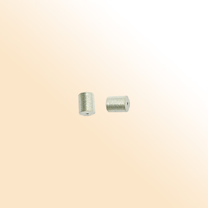 Silver overlay over copper textured cylinder bead handcrafted in India