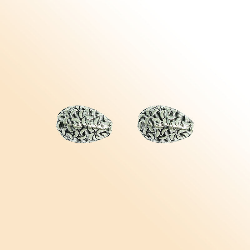 Silver textured teardrop charm handcrafted in India for handmade jewelry designs