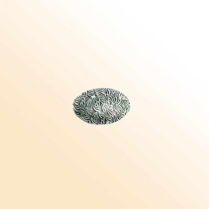 Silver floral oval bead cap from India with engraved leaf texture, handcrafted using silver overlay over copper.