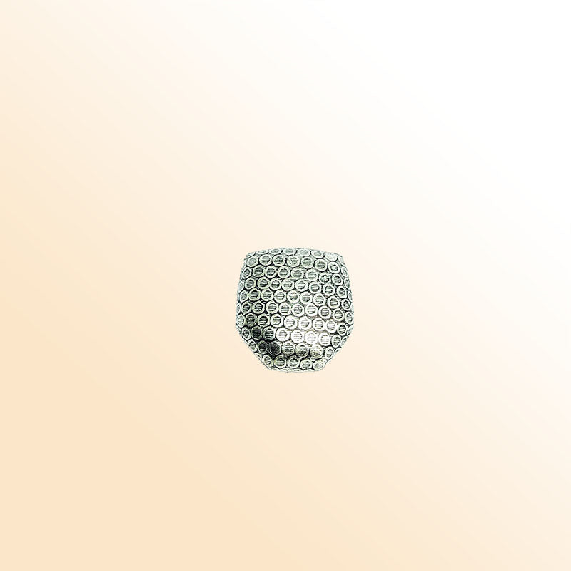 Silver faceted bead cap from India with dotted textured design, handcrafted using silver overlay over copper.