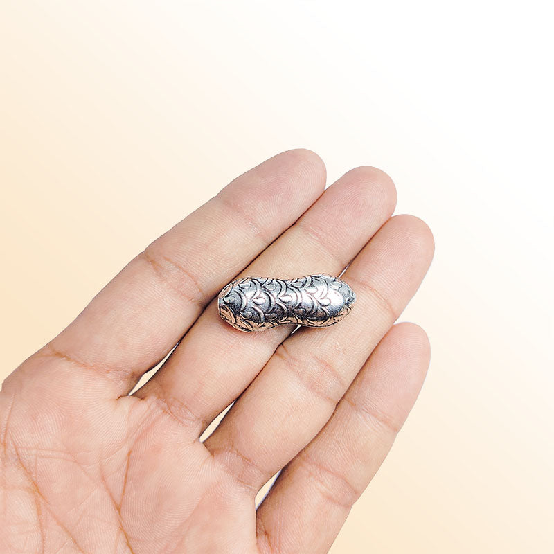 Silver double oval bead cap from India with floral vine textured design, handcrafted using silver overlay over copper.