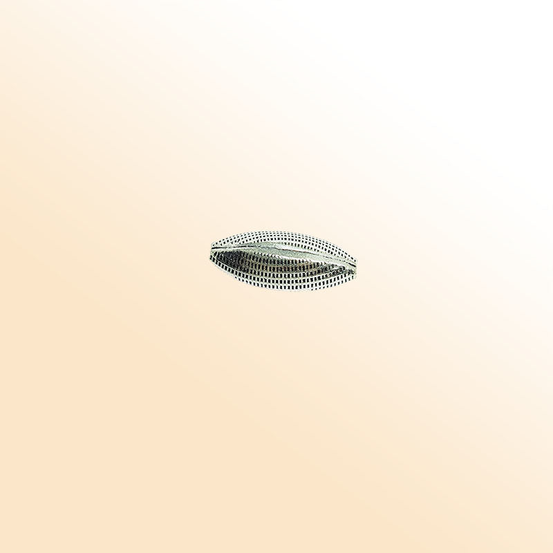 Silver long oval bead cap from India with grid textured pattern, handcrafted using silver overlay over copper.