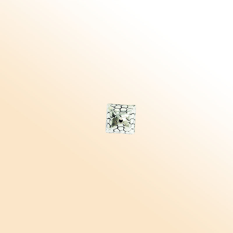 Silver square bead cap from India with pebble textured pattern, handcrafted using silver overlay over copper.