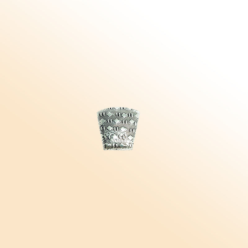 Handcrafted silver overlay over copper trapezoid bead from India with oxidized silver finish for statement jewelry