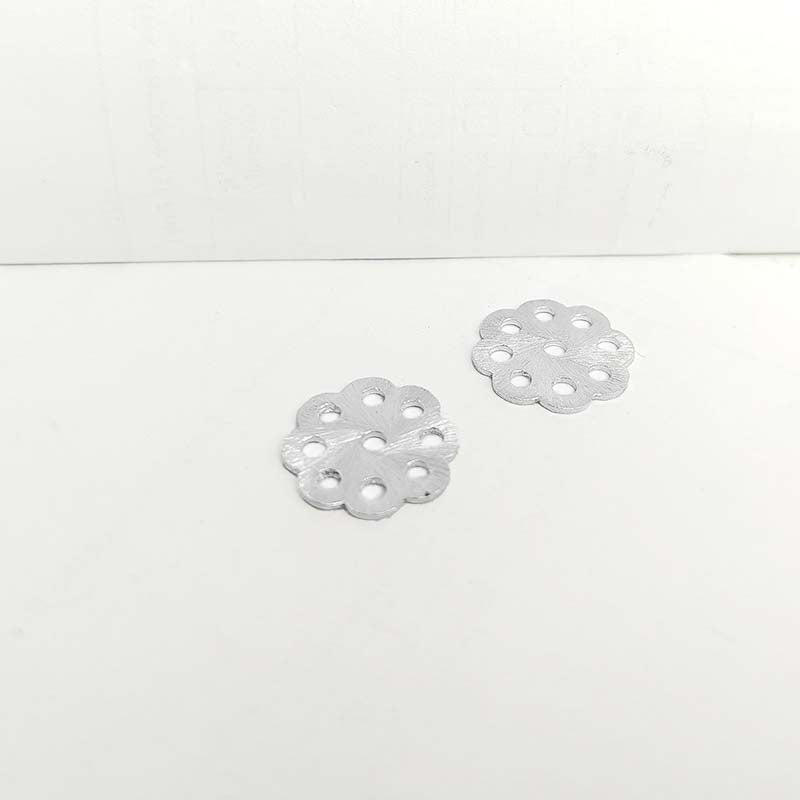 Artisan silver overlay over copper handcrafted floral disc bead with multiple holes made in India for jewelry making