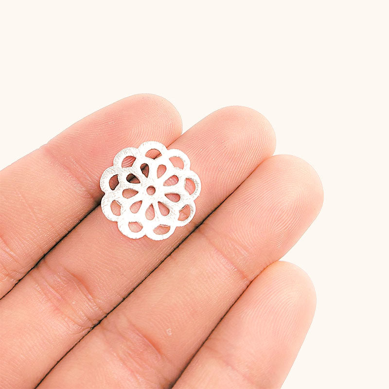 Artisan silver overlay over copper handcrafted openwork floral disc bead made in India for jewelry making