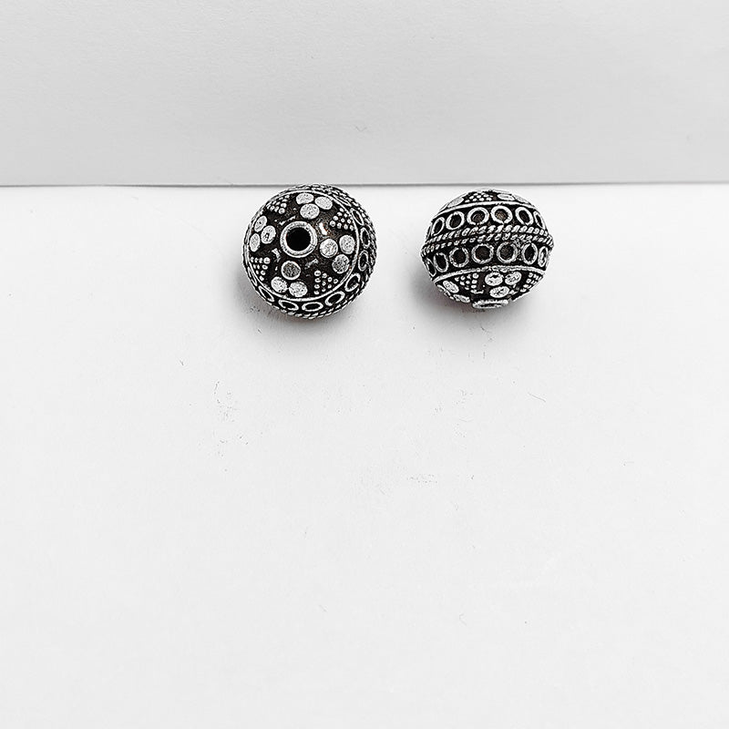 Silver Overlay Over Copper organic pebble bead with textured oxidized finish handcrafted in India for modern jewelry designs