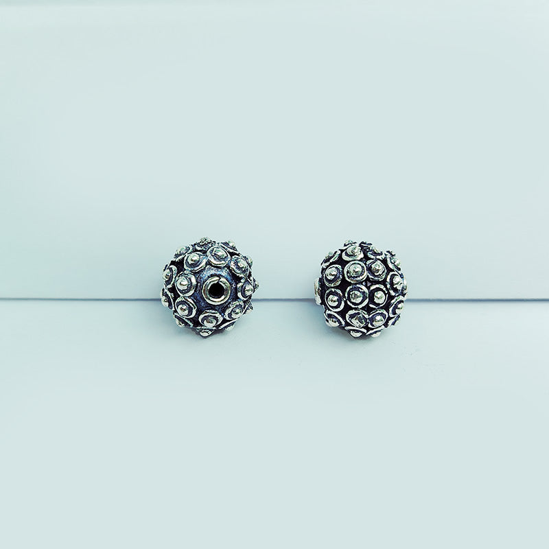 Handcrafted Silver Overlay Over Copper dome beads from India with raised circular dot pattern and antique silver finish for DIY jewelry.