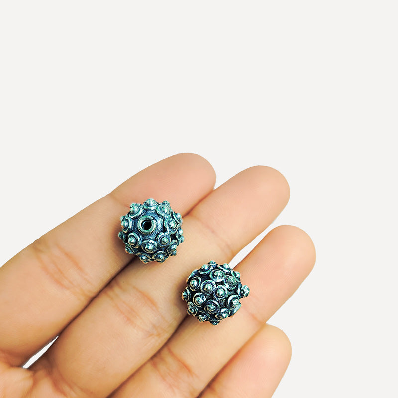 Handcrafted Silver Overlay Over Copper dome beads from India with raised circular dot pattern and antique silver finish for DIY jewelry.