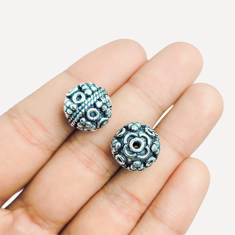 Handcrafted Silver Overlay Over Copper round floral beads from India with antique silver finish for DIY jewelry making.