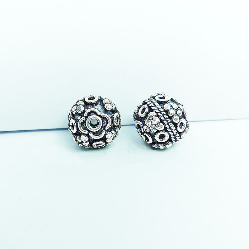 Handcrafted Silver Overlay Over Copper round floral beads from India with antique silver finish for DIY jewelry making.