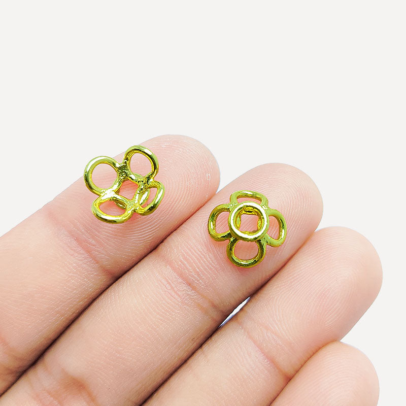 Floral connector bead with four side loops crafted with 18K Gold Overlay Over Copper, handcrafted in India for designer jewelry making.