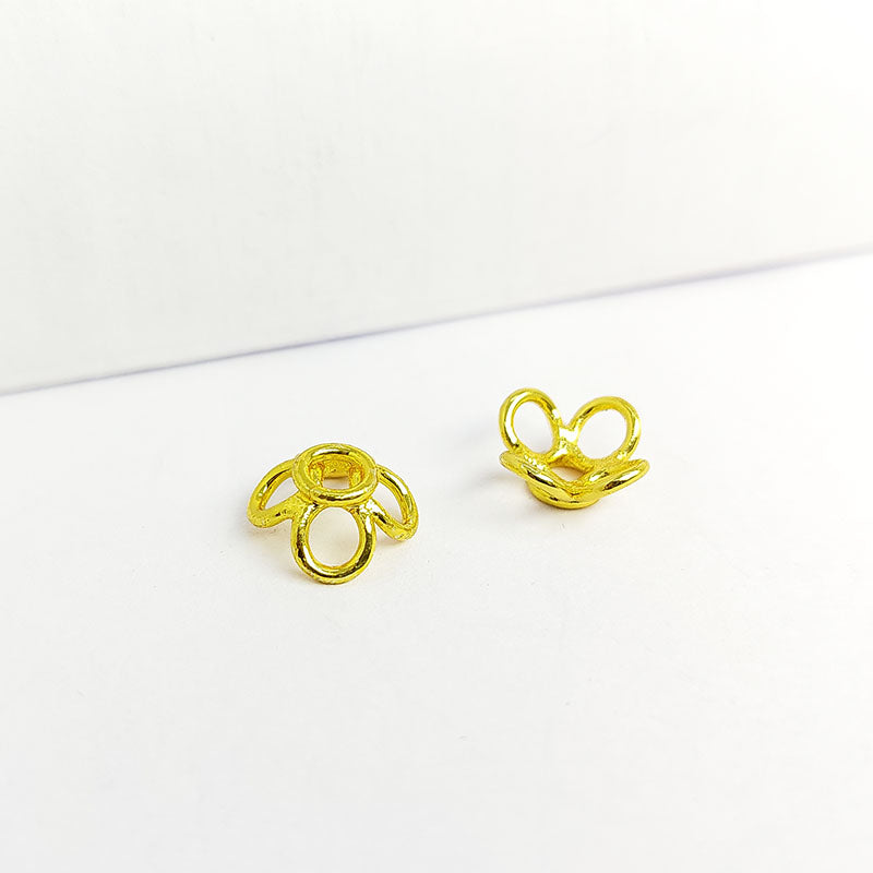 Floral connector bead with four side loops crafted with 18K Gold Overlay Over Copper, handcrafted in India for designer jewelry making.