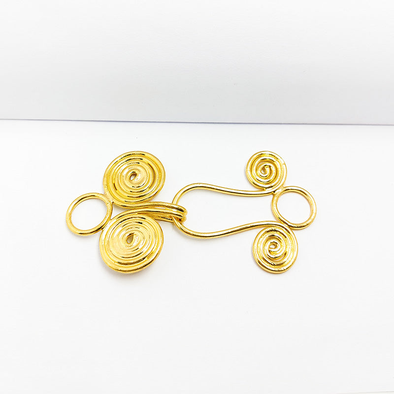 Double spiral wire hook clasp crafted with 18K Gold Overlay Over Copper, handcrafted in India for necklaces and bracelets.