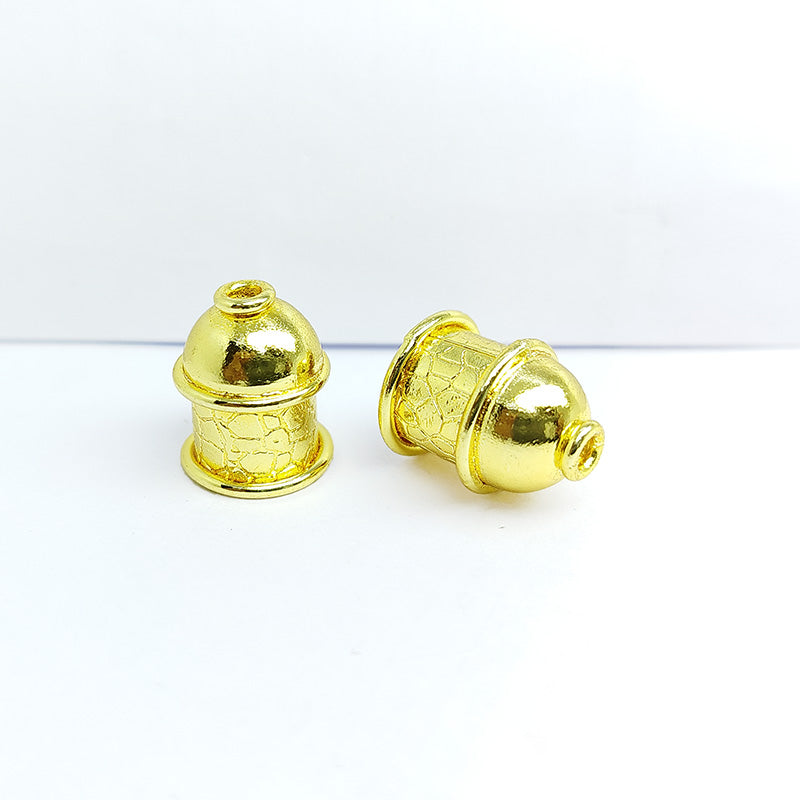 Textured cylinder dome bead cap crafted with 18K Gold Overlay Over Copper, handcrafted in India, suitable for traditional and statement jewelry.