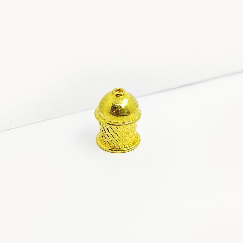Diagonal textured cylinder dome bead cap crafted with 18K Gold Overlay Over Copper, handcrafted in India, suitable for traditional and statement jewelry.
