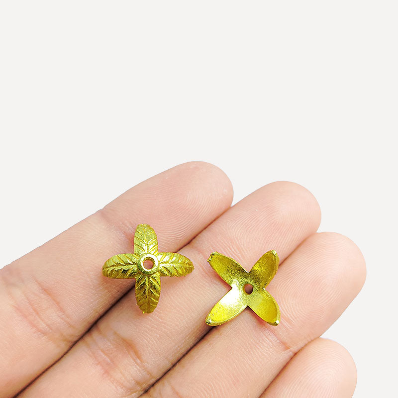 Handcrafted four-petal floral spacer made with 18K Gold Overlay Over Copper from India for jewelry making