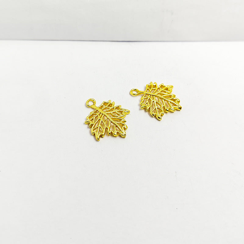 Elegant leaf cutout charm with openwork design, 18K Gold Overlay Over Copper, handcrafted in India.