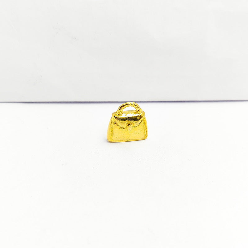Handbag pendant crafted with 18K Gold Overlay Over Copper, handcrafted fashion jewelry from India.
