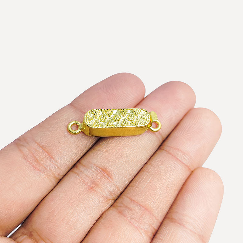 Textured oval jewelry clasp crafted with 18K Gold Overlay Over Copper, handcrafted closure from India.