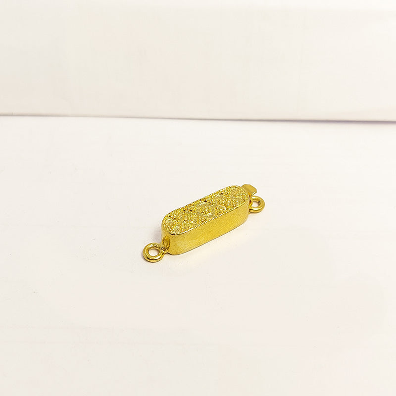 Textured oval jewelry clasp crafted with 18K Gold Overlay Over Copper, handcrafted closure from India.