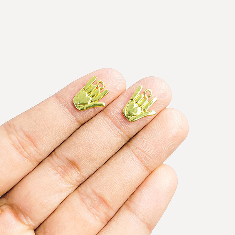 Handcrafted hand shape pendant in 18K Gold Overlay Over Copper from India for symbolic and artistic jewelry designs.
