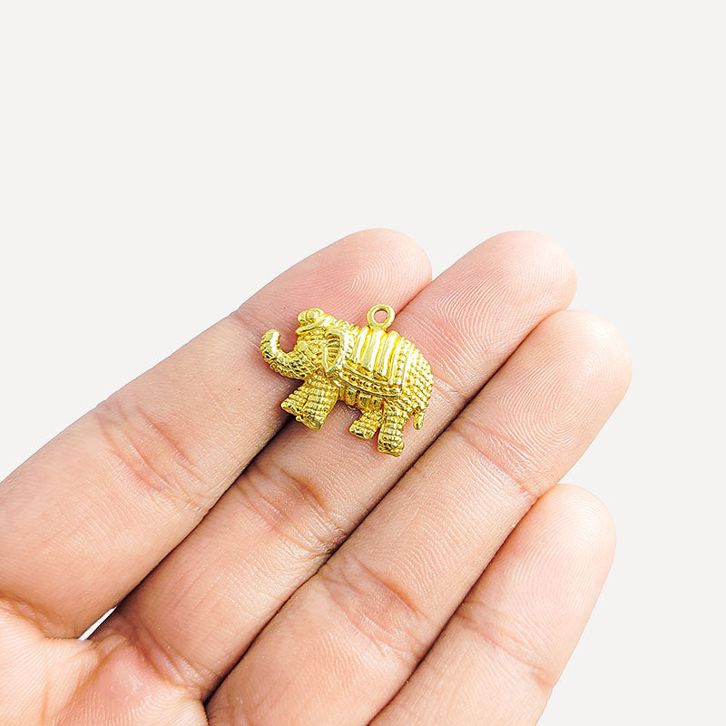 Handcrafted elephant shape pendant in 18K Gold Overlay Over Copper from India for symbolic and artistic jewelry designs.