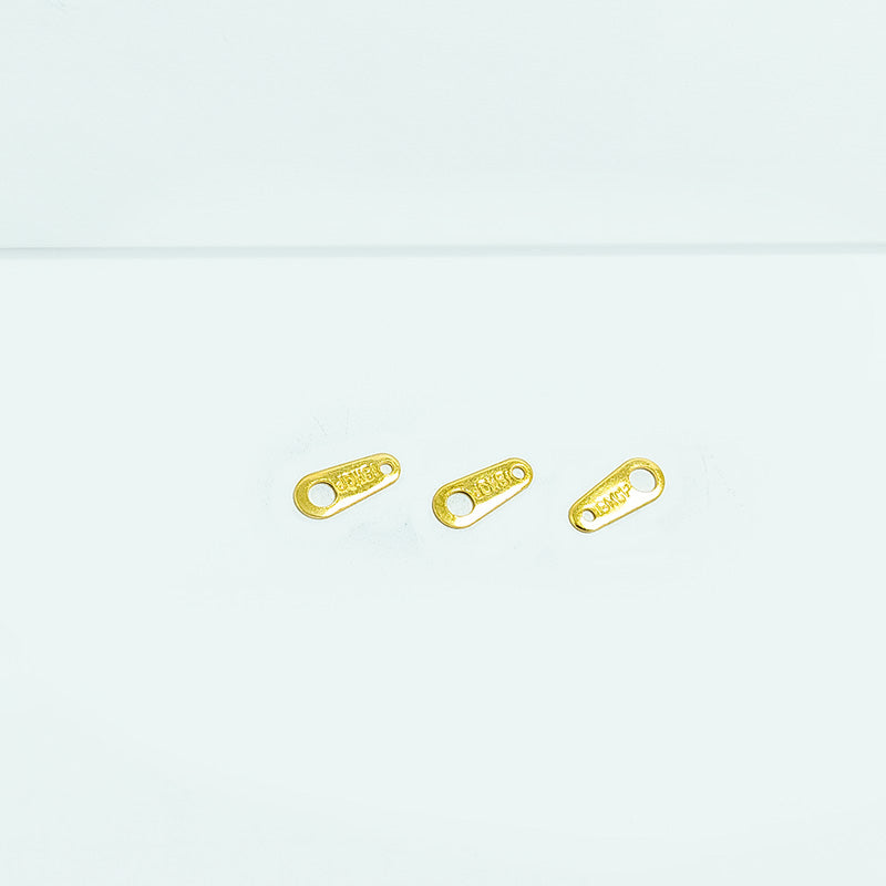 Handcrafted dual hole connector in 18K Gold Overlay Over Copper from India for minimal and modern jewelry designs.