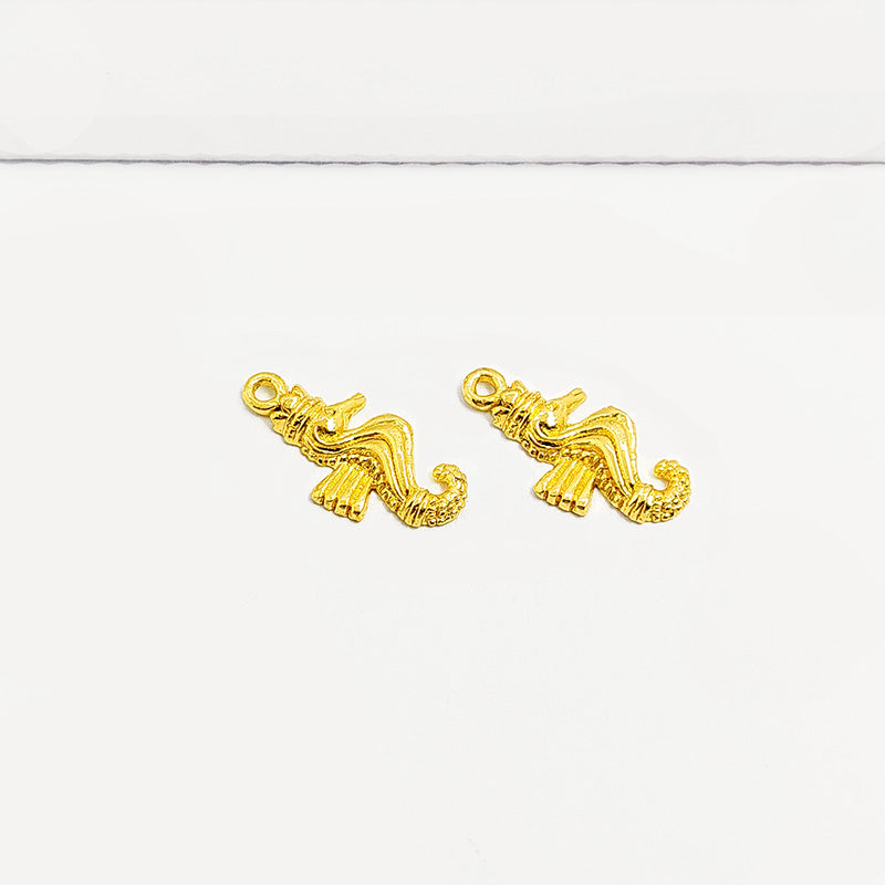 Handcrafted seahorse charm in 18K Gold Overlay Over Copper from India for nautical and ocean-inspired jewelry designs.