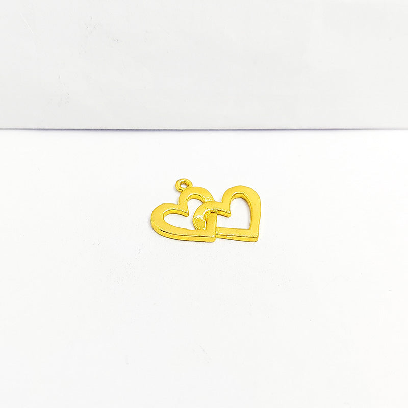 Double heart pendant in 18K Gold Overlay Over Copper handcrafted in India with textured gold finish for retail jewelry customers